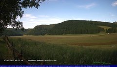 view from Webcam Cansiglio - verso la piana dei "Bech" on 2025-07-03