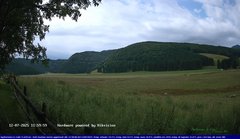 view from Webcam Cansiglio - verso la piana dei "Bech" on 2025-07-12