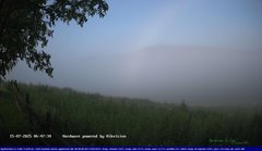 view from Webcam Cansiglio - verso la piana dei "Bech" on 2025-07-15