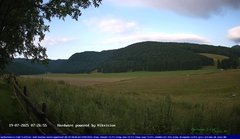 view from Webcam Cansiglio - verso la piana dei "Bech" on 2025-07-19