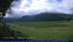 view from Webcam Cansiglio - verso la piana dei "Bech" on 2023-09-17