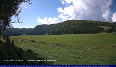 view from Webcam Cansiglio - verso la piana dei "Bech" on 2023-09-23